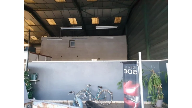 1597047721_2_Amenagement bureaux et atelier garage Peugeot Saint Jory par AG Concept 31